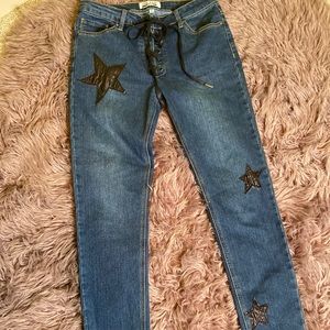 DENIM PANT WITH BLACK FAUX LEATHER ACCENTS